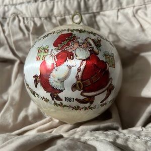 Vintage Christmas Ornament Santa Clause kisses Mrs Clause.